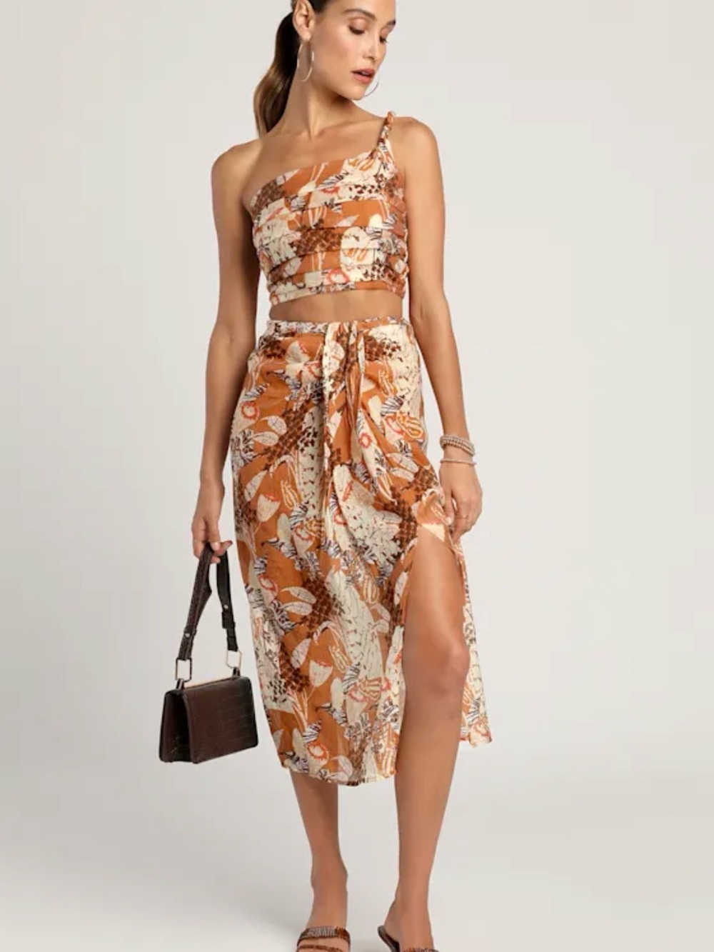 Something Wild Brown Multi Print Twist-Front Midi Skirt
Lulus
